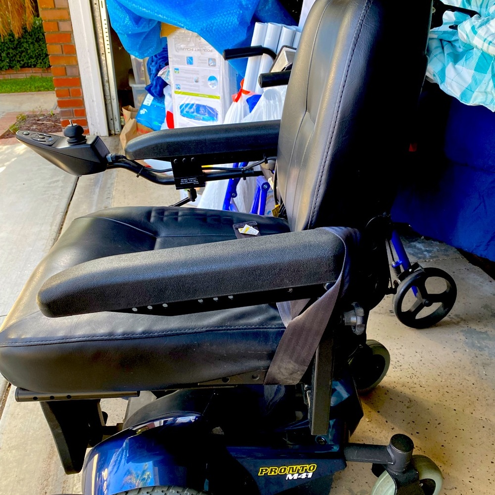 Handicap chair for women or men. Gray electrical